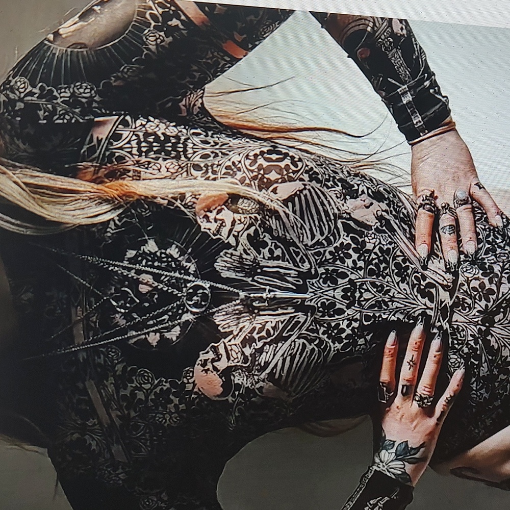 NWT SHEER SKULL BODYSUIT